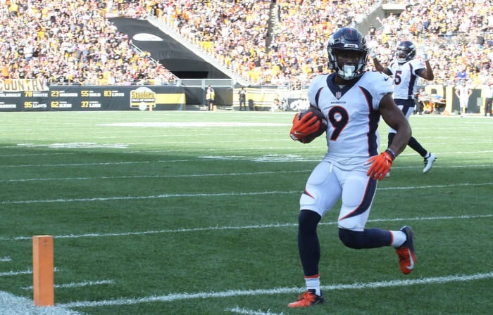 Denver Broncos wide receiver Kendall Hinton (9) scores a touchdown on a two yard pass against the Pittsburgh Steelers during the fourth quarter at Heinz Field. The Steelers won 27-19.